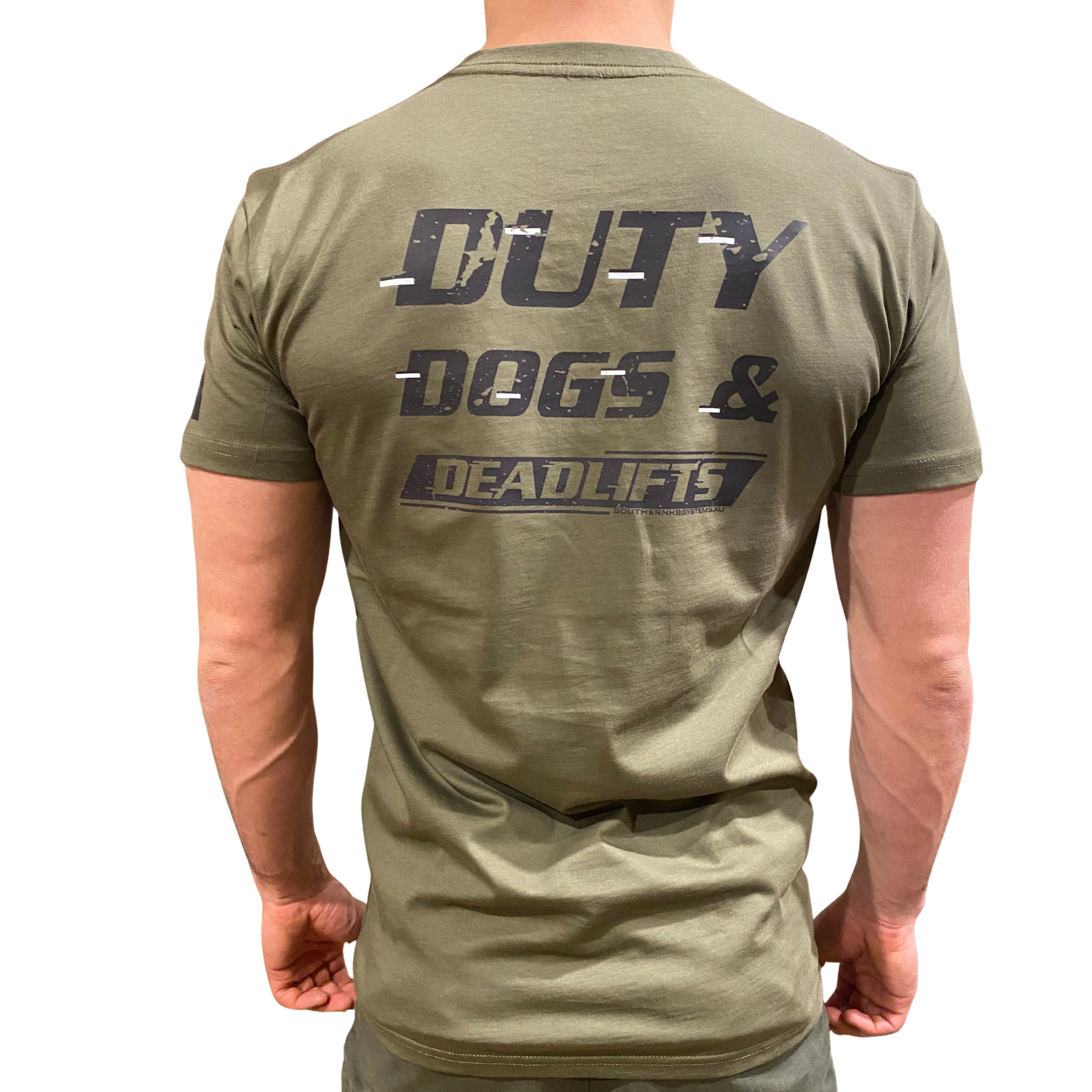 Green t-shirt with 'Duty Dogs & Deadlifts' text on the back, worn by a person.